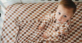 What Babies Should Wear While Sleeping in Their Crib