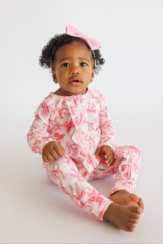 BOW CHECKERED CHARM DREAM RUFFLE ROMPER