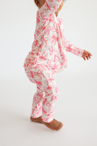 BOW CHECKERED CHARM DREAM RUFFLE ROMPER