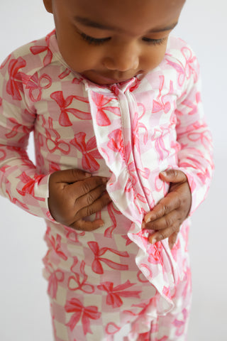 BOW CHECKERED CHARM DREAM RUFFLE ROMPER