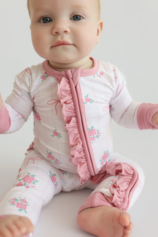 TIED WITH ROSES DREAM RUFFLE ROMPER