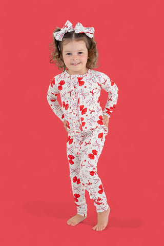 PITCH PERFECT BOWS DREAM RUFFLE ROMPER