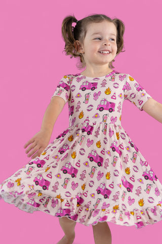 BLAZING BOWS AND HYDRANTS DREAM RUFFLE DRESS