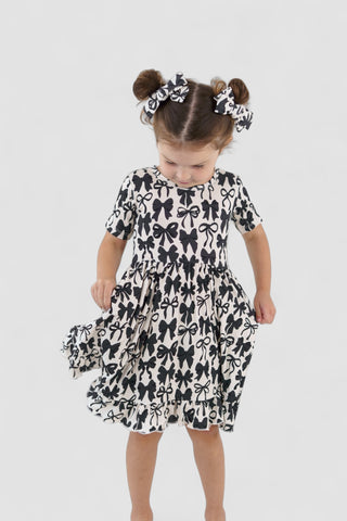 NEUTRAL BOWS DREAM RUFFLE DRESS
