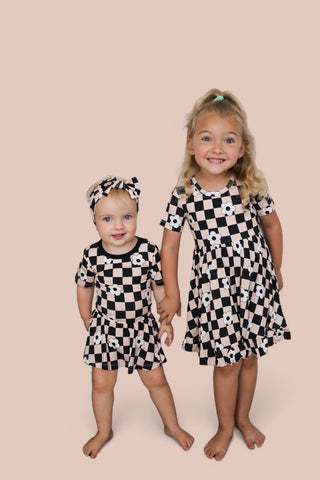 RETRO DAISY CHECKS DREAM SHORT SLEEVE RUFFLE DRESS