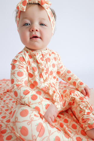 PEACH PERFECT BOWS DREAM RUFFLE ROMPER