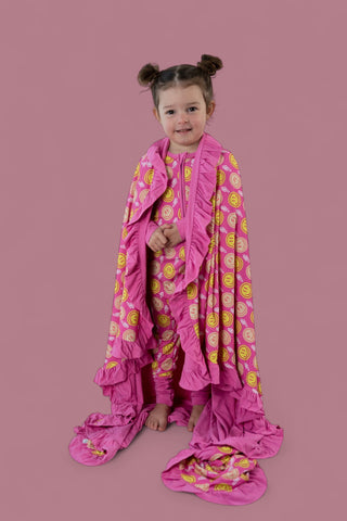 RADIANT SMILES DREAM RUFFLE BLANKET