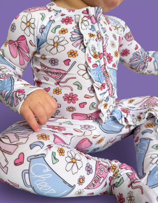 POM POWER DREAM RUFFLE ROMPER