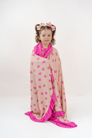 PUCKER UP DREAM RUFFLE BLANKET