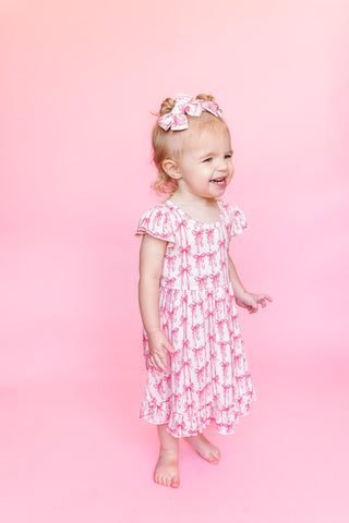 BOW CUTE DREAM RUFFLE DRESS