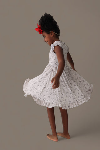 EXCLUSIVE SWING FOR THE STARS DREAM CAP SLEEVE RUFFLE DRESS