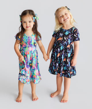 OCEAN GLOW CAP SLEEVE DREAM RUFFLE DRESS