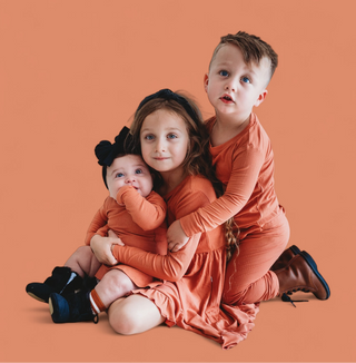 RUST LONG SLEEVE DREAM RUFFLE DRESS