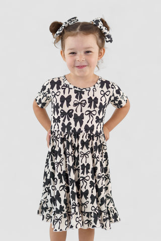 NEUTRAL BOWS DREAM RUFFLE DRESS