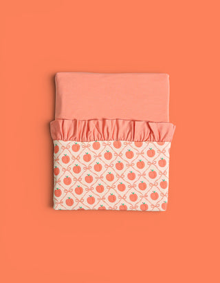 PEACH PERFECT BOWS DREAM RUFFLE BLANKET