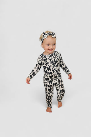 NEUTRAL BOWS DREAM RUFFLE ROMPER