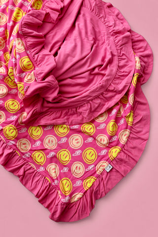 RADIANT SMILES DREAM RUFFLE BLANKET