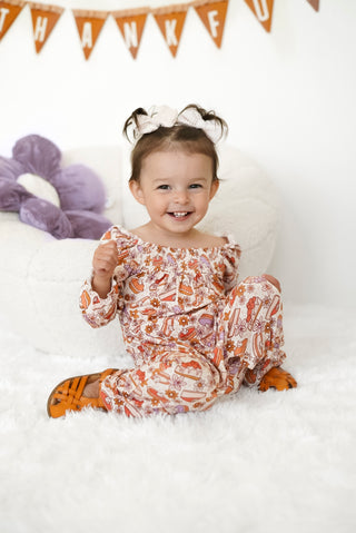 CUTE AS PIE DREAM SMOCKED JUMPSUIT