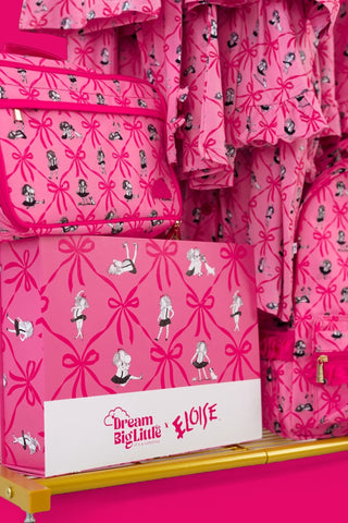 Pink gift box set with bow and character print pattern, labeled Dream Big Little Eloise.