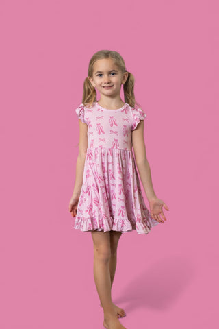 BALLET BOW BLISS DREAM CAP SLEEVE RUFFLE DRESS