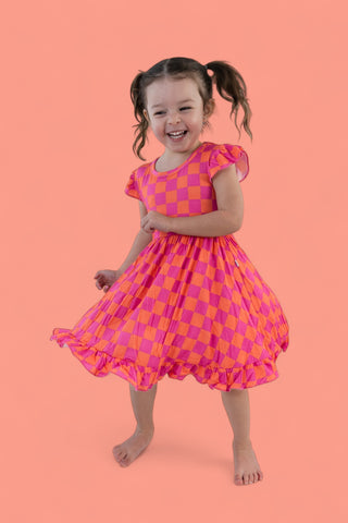 NEON DREAMS CHECKERS DREAM RUFFLE DRESS