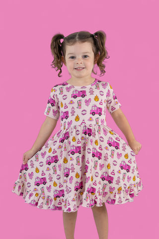 BLAZING BOWS AND HYDRANTS DREAM RUFFLE DRESS