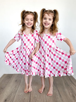 DREAMY PINK CHECKERS DREAM RUFFLE DRESS