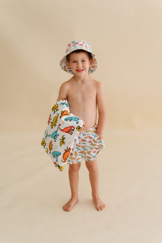 COLOR ME DINO DREAM SWIM TRUNKS