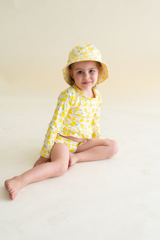 LEMON BLOSSOMS DREAM RASH GUARD RUFFLE TWO-PIECE SWIM SUIT