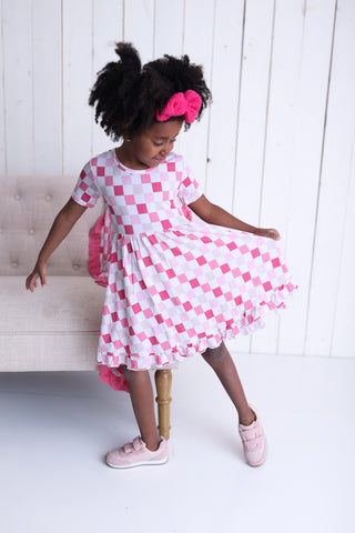 DREAMY PINK CHECKERS DREAM RUFFLE DRESS