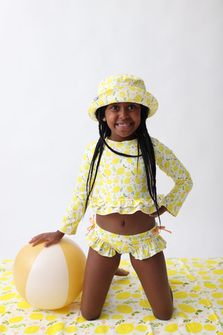 LEMON BLOSSOMS DREAM RASH GUARD RUFFLE TWO-PIECE SWIM SUIT