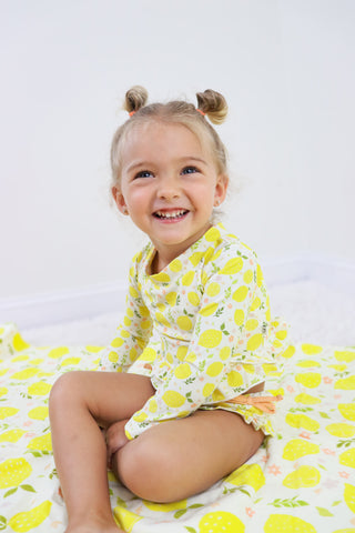 LEMON BLOSSOMS DREAM RASH GUARD RUFFLE TWO-PIECE SWIM SUIT