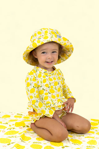 LEMON BLOSSOMS DREAM RASH GUARD RUFFLE TWO-PIECE SWIM SUIT