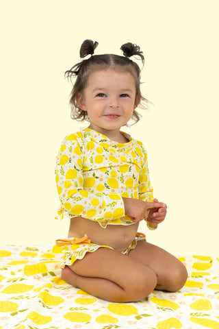 LEMON BLOSSOMS DREAM RASH GUARD RUFFLE TWO-PIECE SWIM SUIT