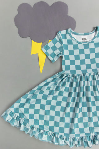 STORMY CHECKERS DREAM RUFFLE DRESS