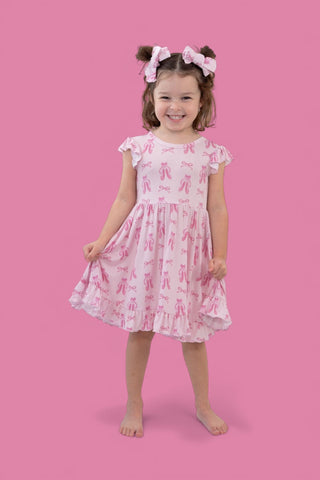 BALLET BOW BLISS DREAM CAP SLEEVE RUFFLE DRESS