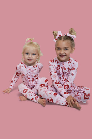 SEALED WITH LOVE DREAM RUFFLE ROMPER