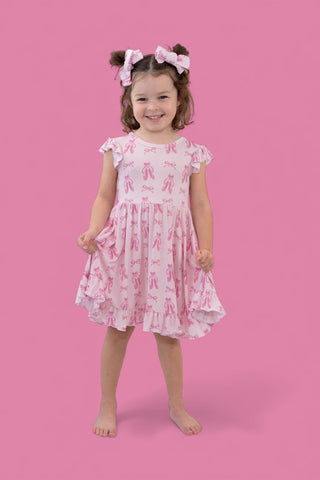 BALLET BOW BLISS DREAM CAP SLEEVE RUFFLE DRESS